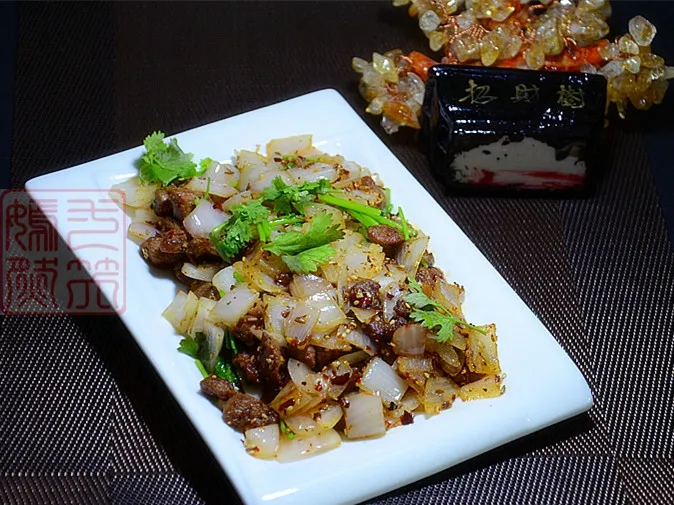 Agneau au cumin avec oignon